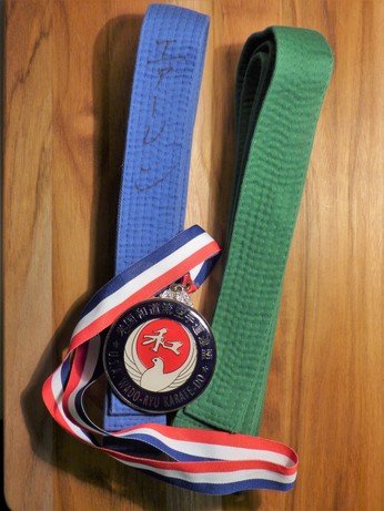 karate belts and a medal